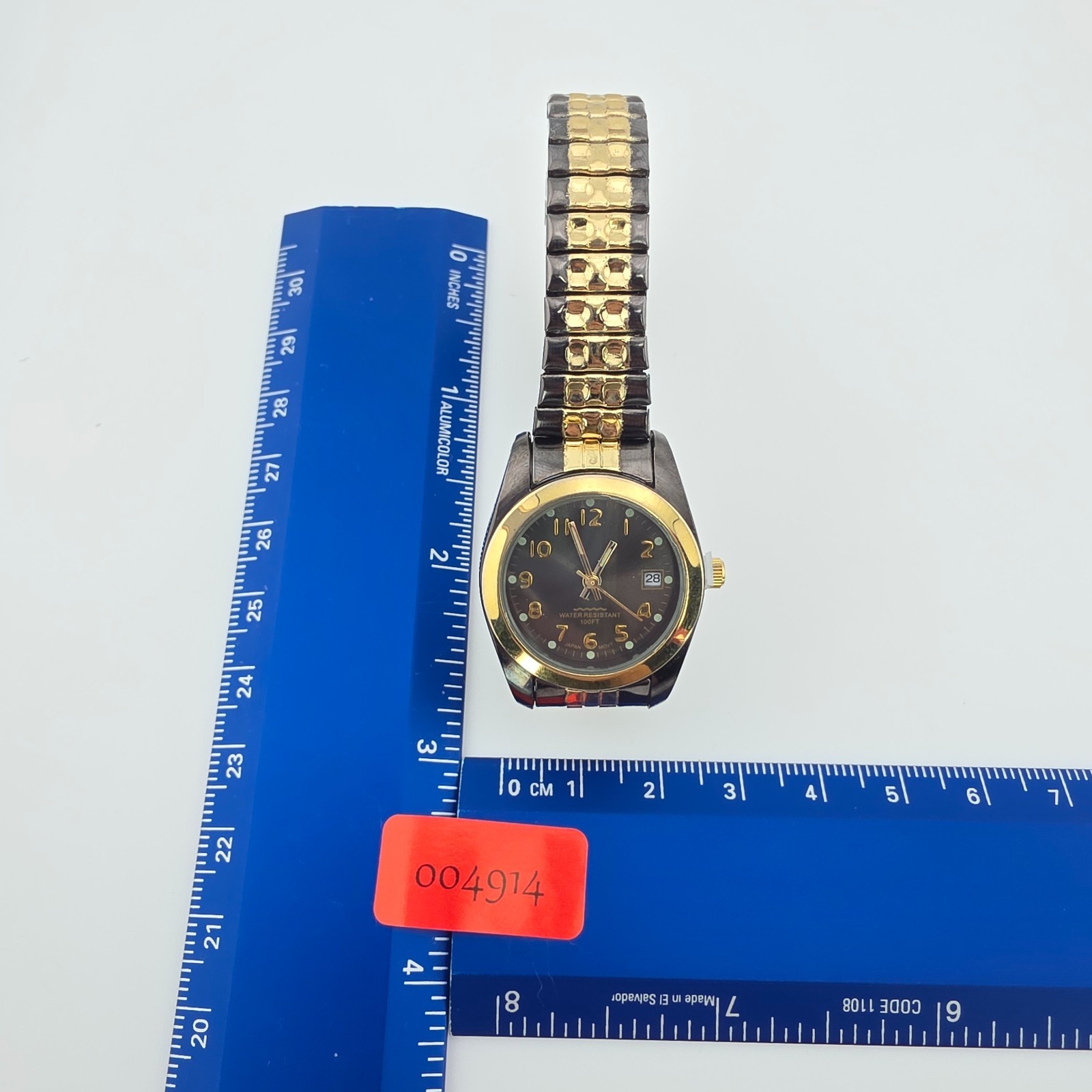 M.Z. BERGER & CO. Ladies Stretch Watch H2O Resistant Black Gold Ion Plated 6.25″