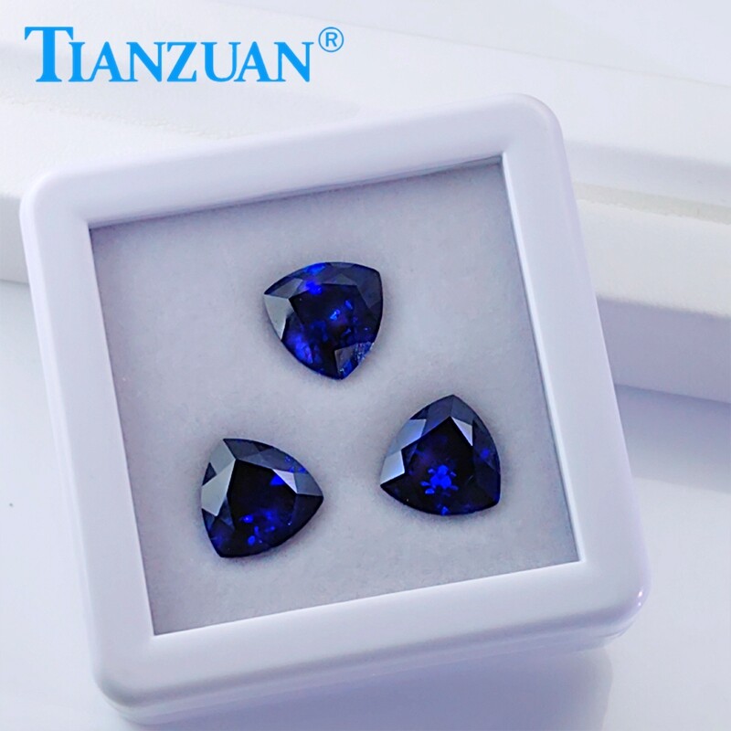 Lab Created Trillion shape Royal Blue Sapphire loose gemstone with Inclusions