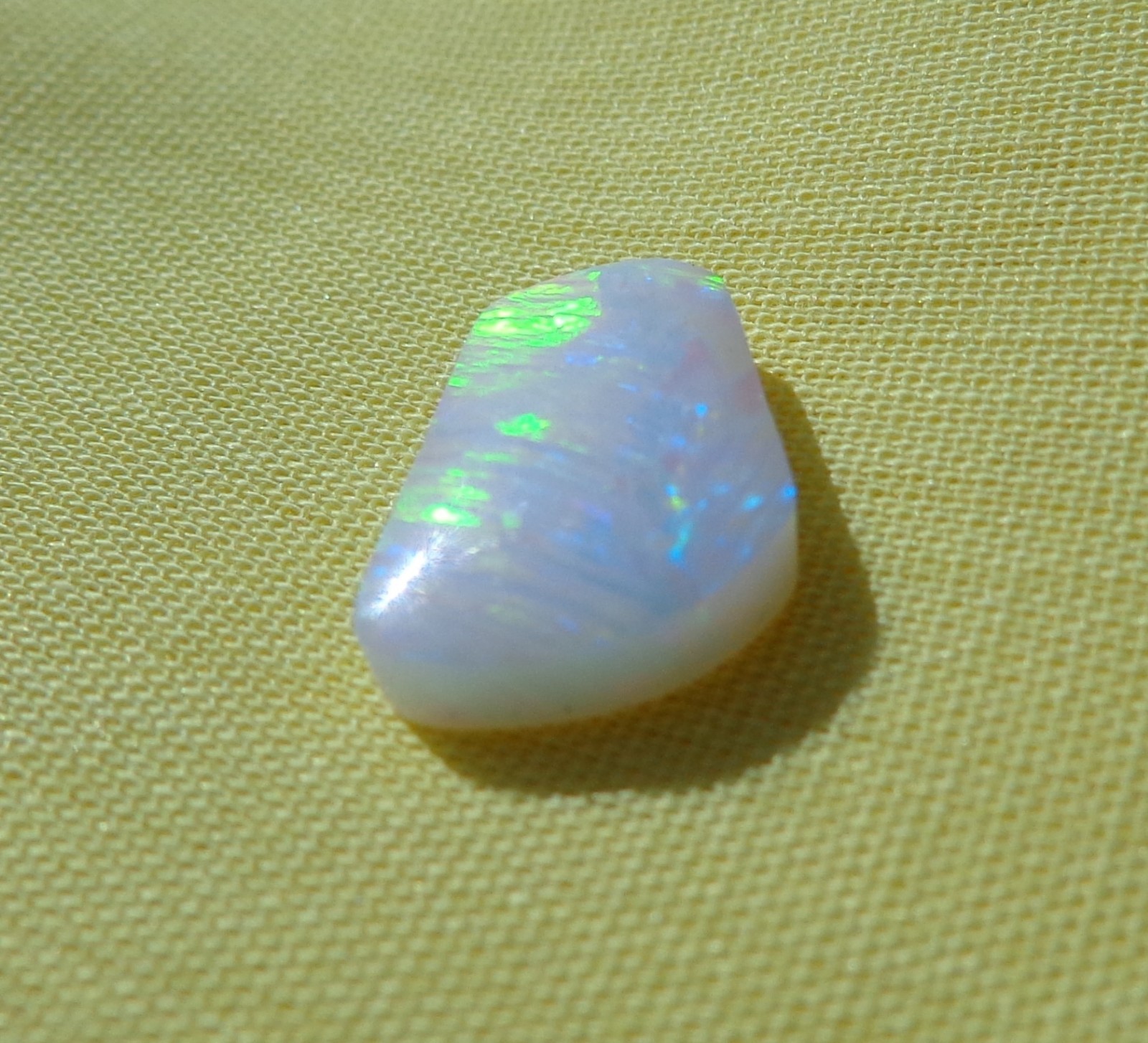 Spencer Idaho Opal Solid 9X15 mm with Unique Pattern and Red, Green, & Gold Fire