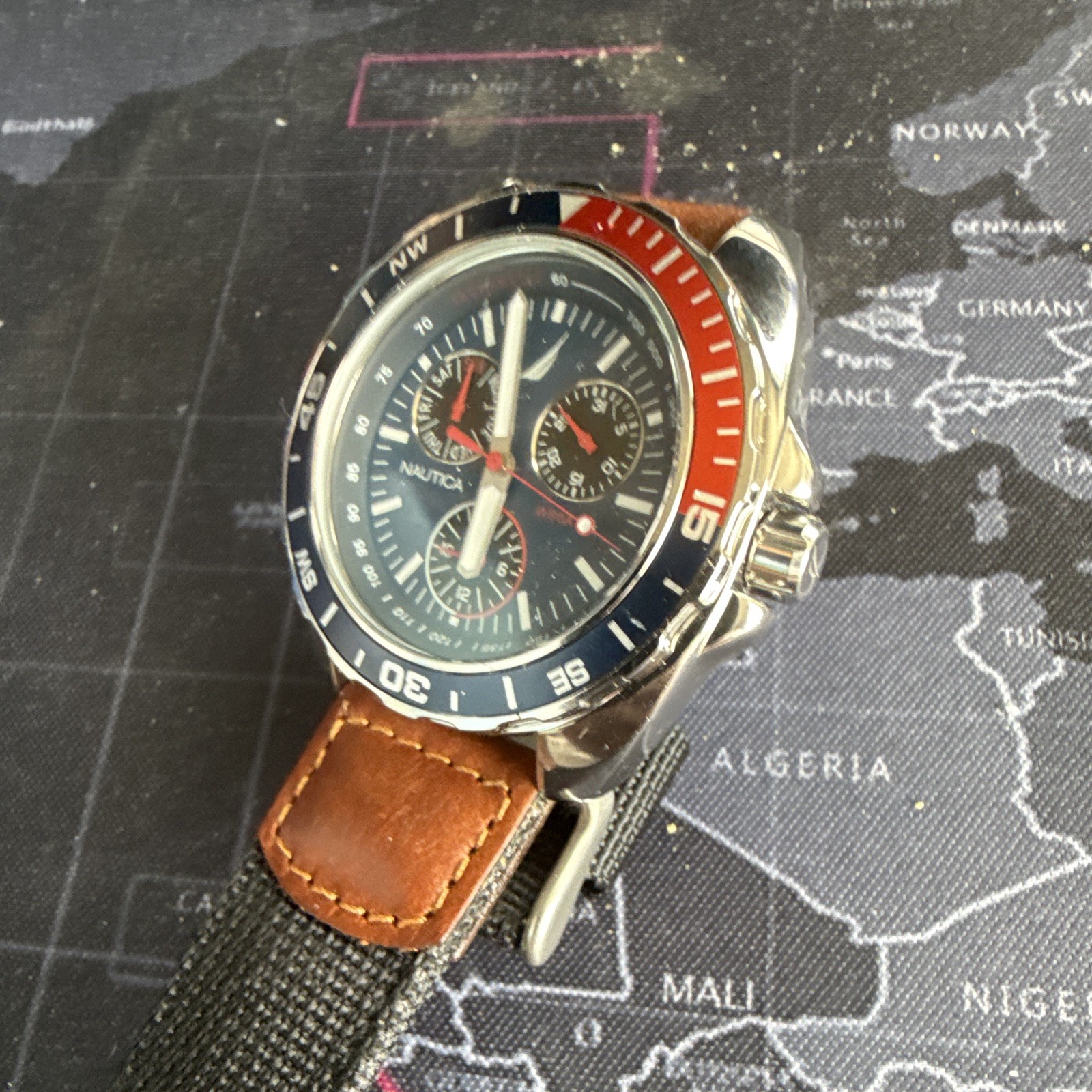 Nautica Men’s Quartz Sport Chronograph Tachymeter Blue Dial Red/Blue Bezel