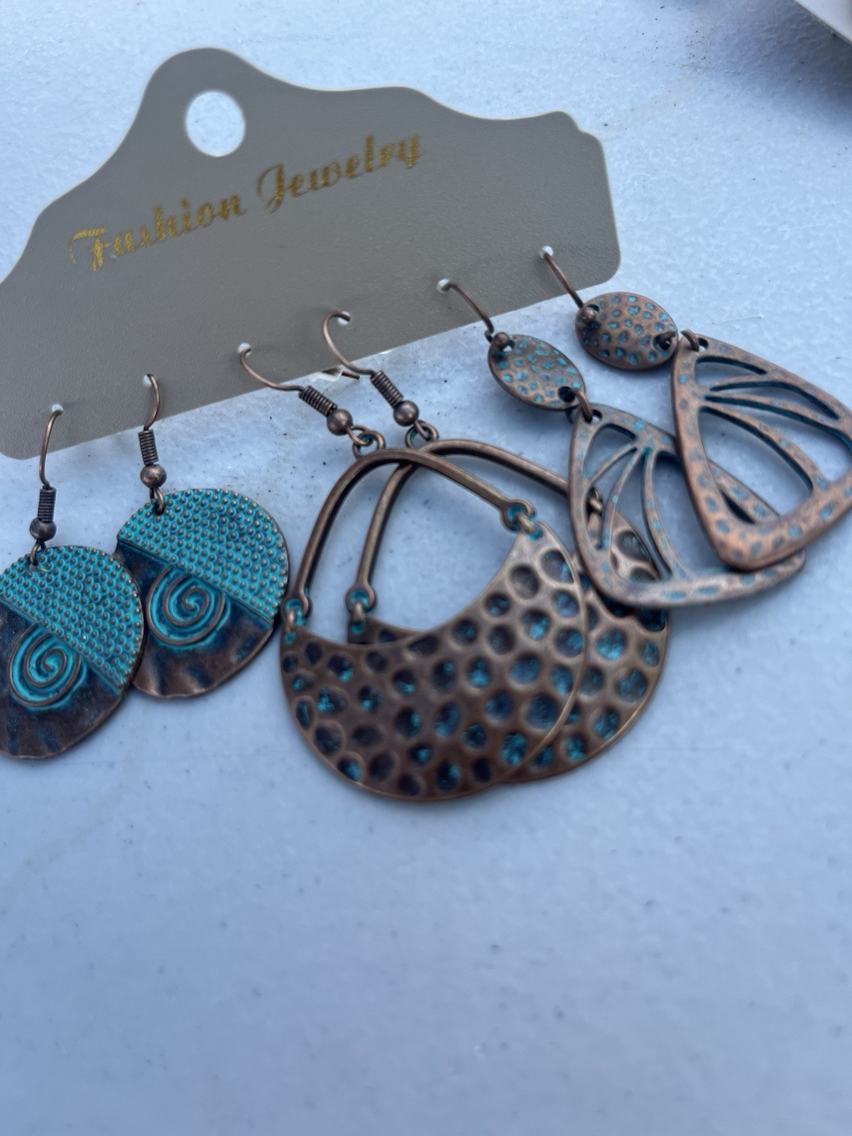 12 pair Bohemian dangle Turquoise/ bronze earrings- brand new