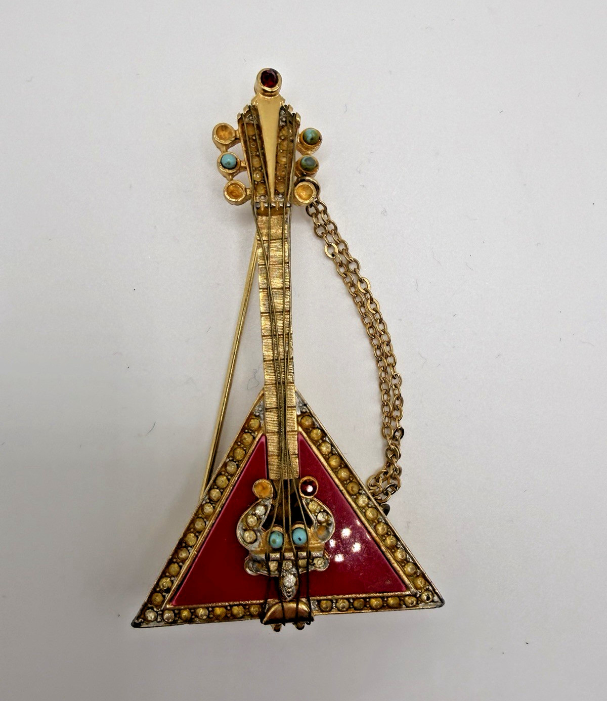 Vintage R Mandle Signed Gold Tone Red Rhinestone Triangle Mandolin Brooch