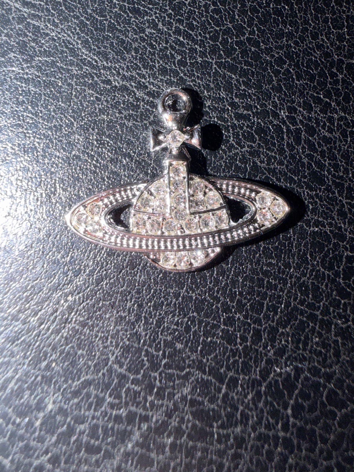 Orb pendant With a silver-tone finish with clear, rhinestones