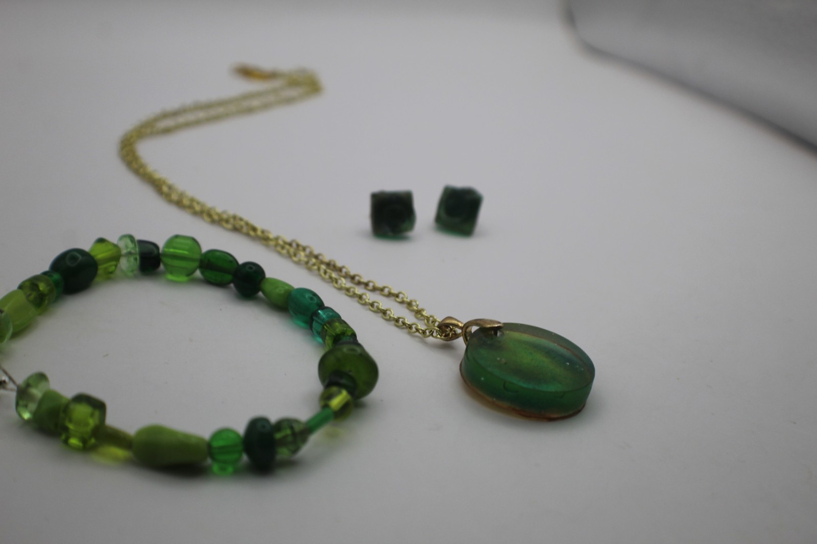 Green Three Piece Resin Jewelry Set Including Necklace Studs And Bracelet