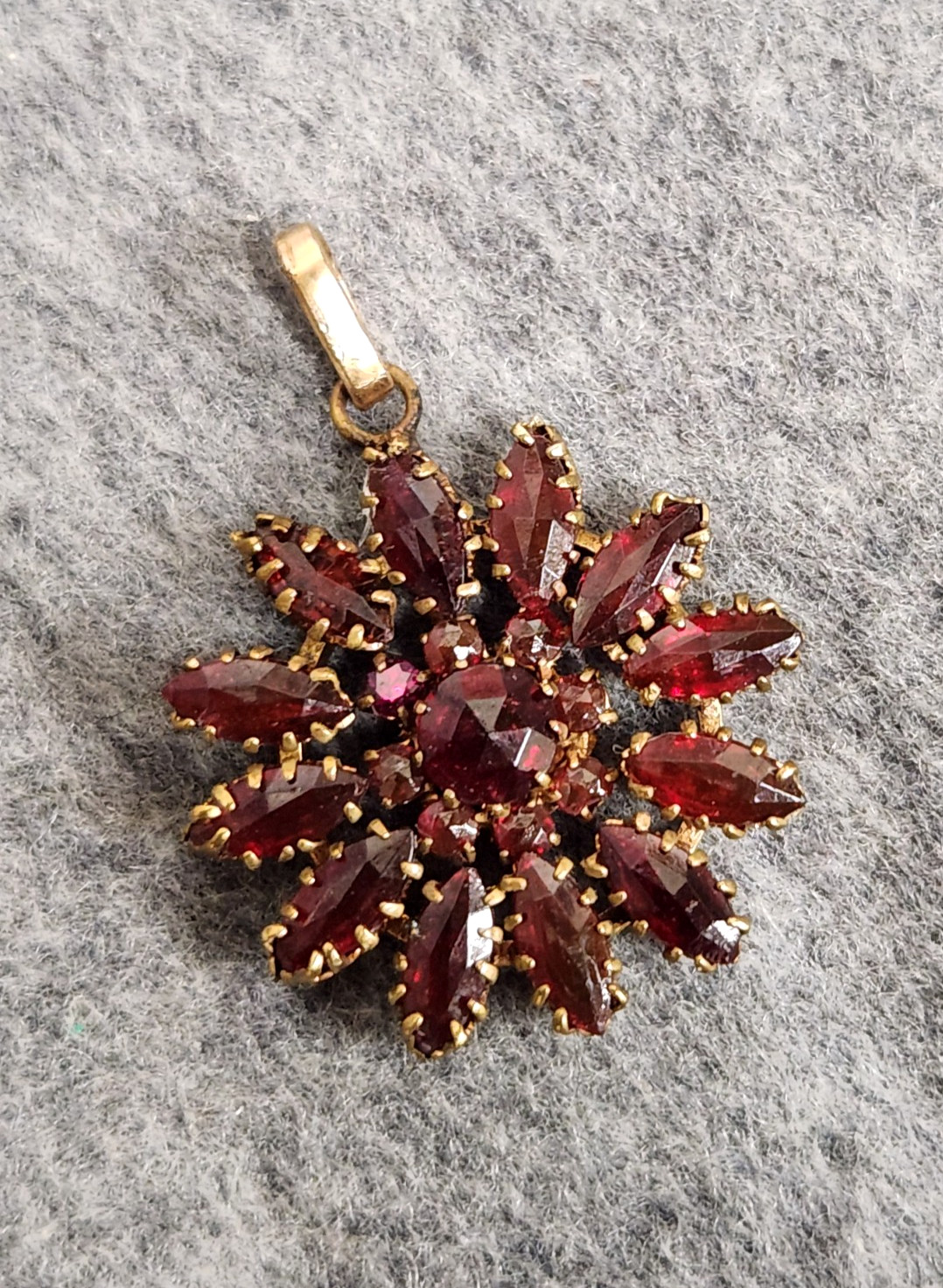 Vintage Gilt Metal Bohemian Red Glass Stone Starburst Floral Pendant 1 3/8″ Tall