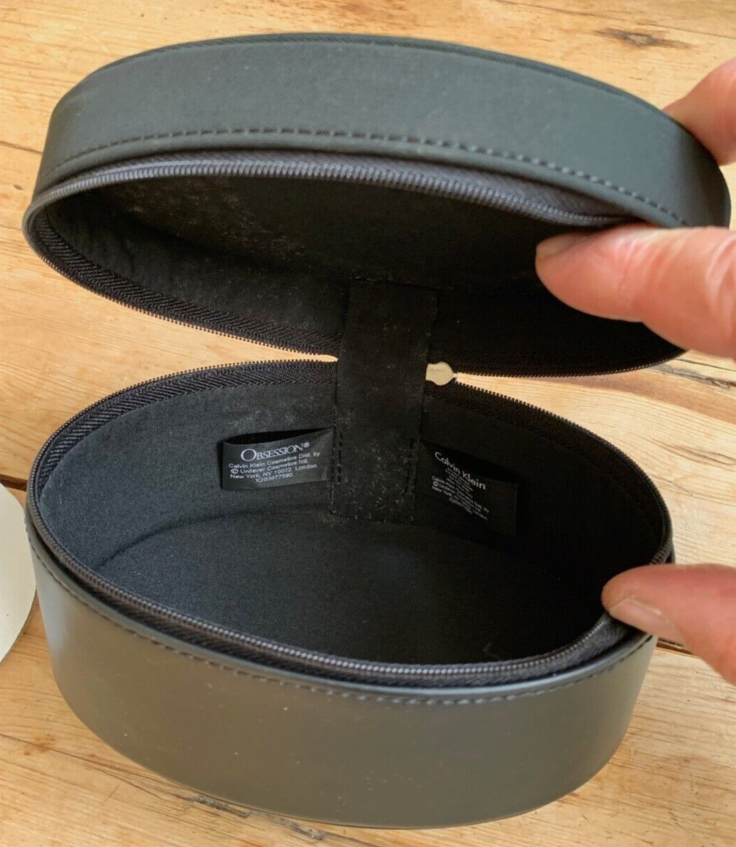 CALVIN KLEIN – BLACK FAUX LEATHER / FABRIC OVAL JEWELRY BOX – 6″ x 4″ x 3 1/2″