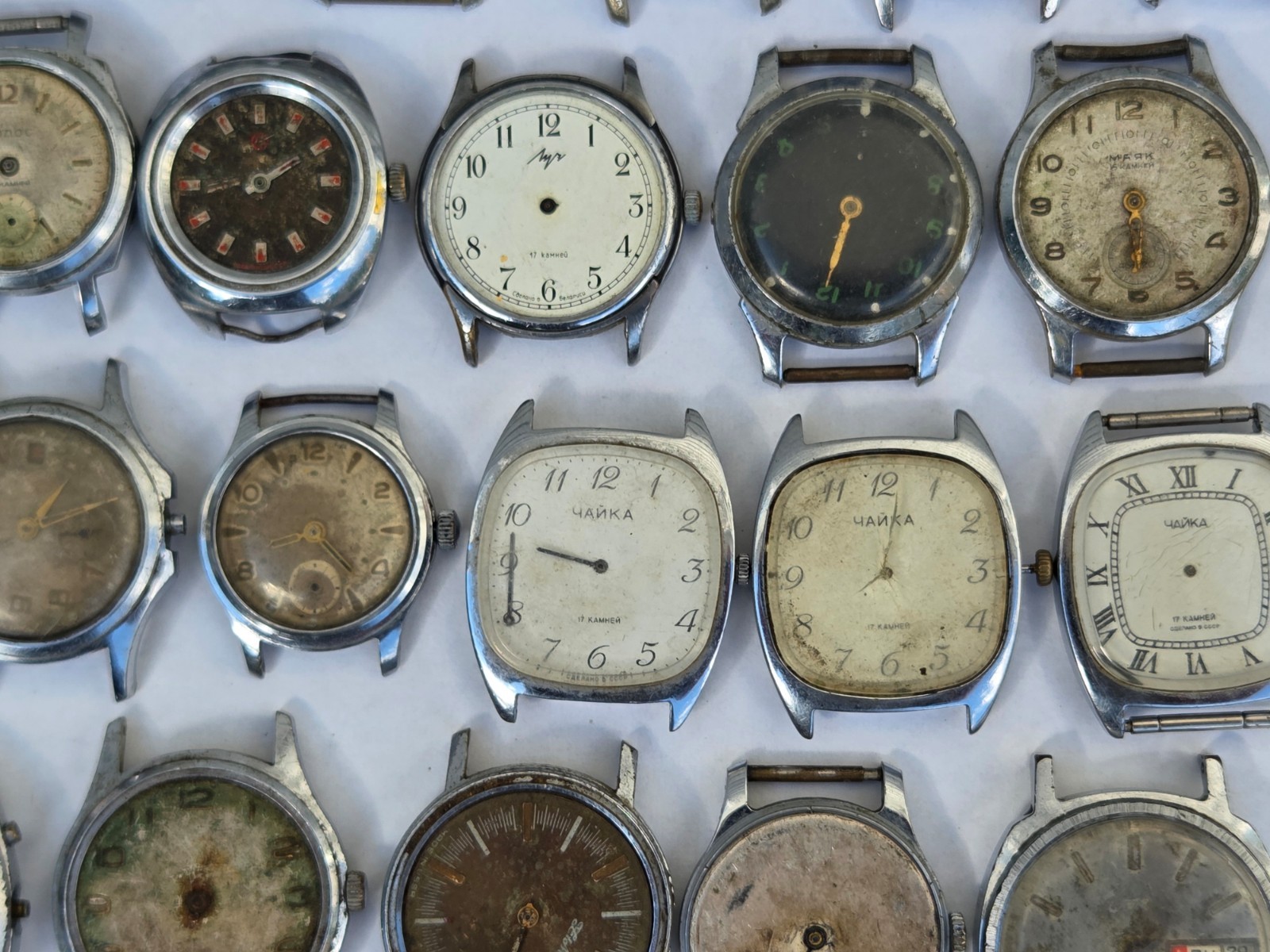 Lot of 75 Russian Watches Vostok Pobeda Mayak Zim etc Not working for parts Read