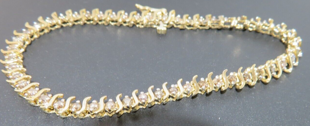 10K LADIES DIAMOND TENNIS BRACELET 1.00 tcw 7″ LONG 4.49 MM WIDE 6.42g(6132597-9