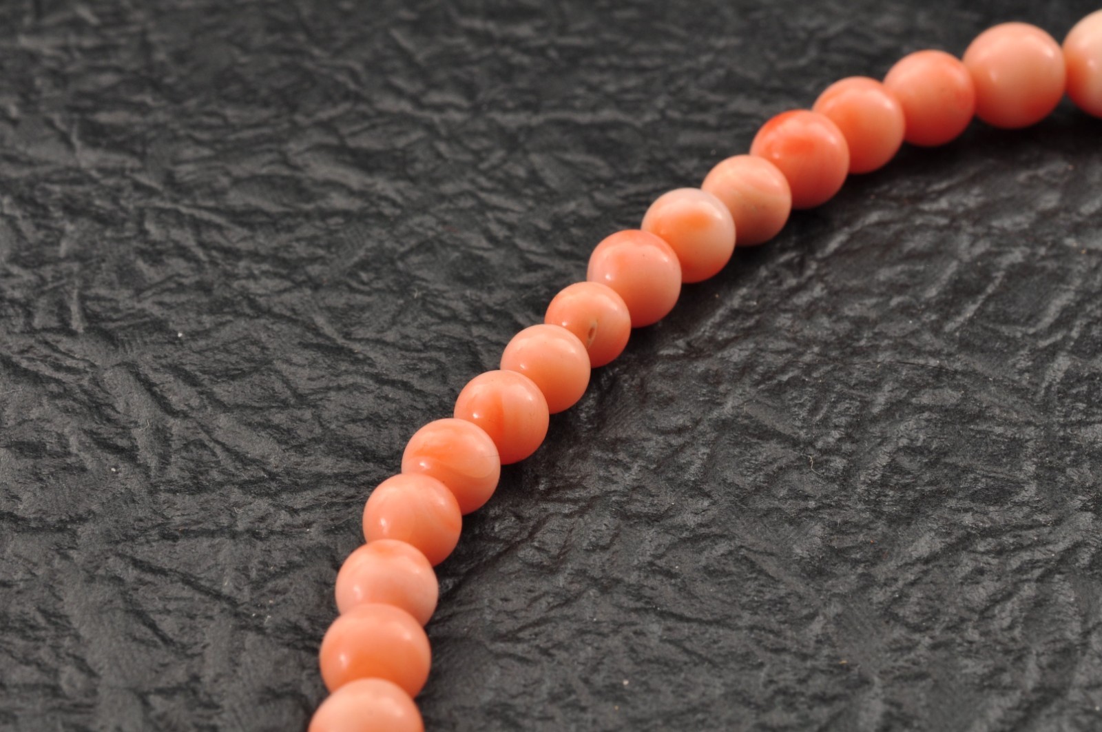 Salmon pink coral Necklace and ear clip set (total 116ct) with Certificate case.