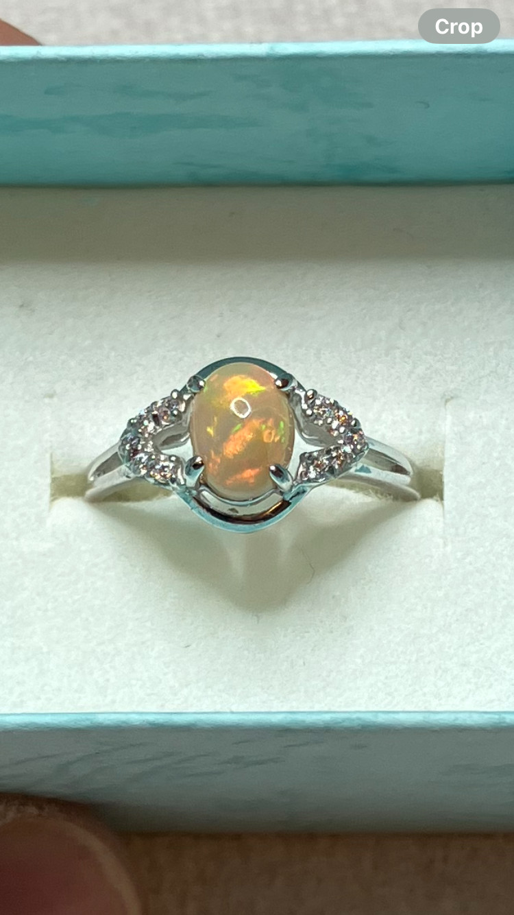 #138B- 0.95ct Genuine Ethiopian Welo Opal set in a Size 8.5 Sterling Silver Ring
