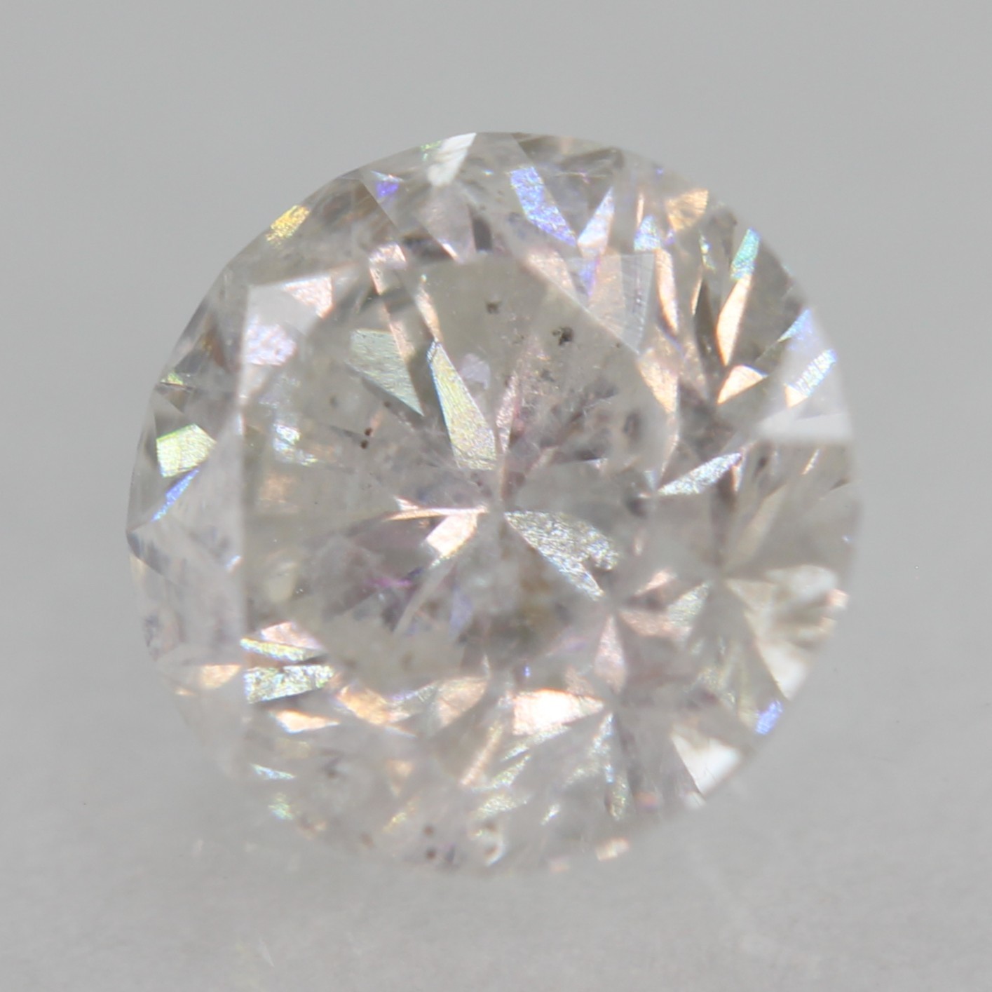 Certified 0.65 Carat E SI2 Round Brilliant Natural Enhanced MINED Diamond 5.37mm