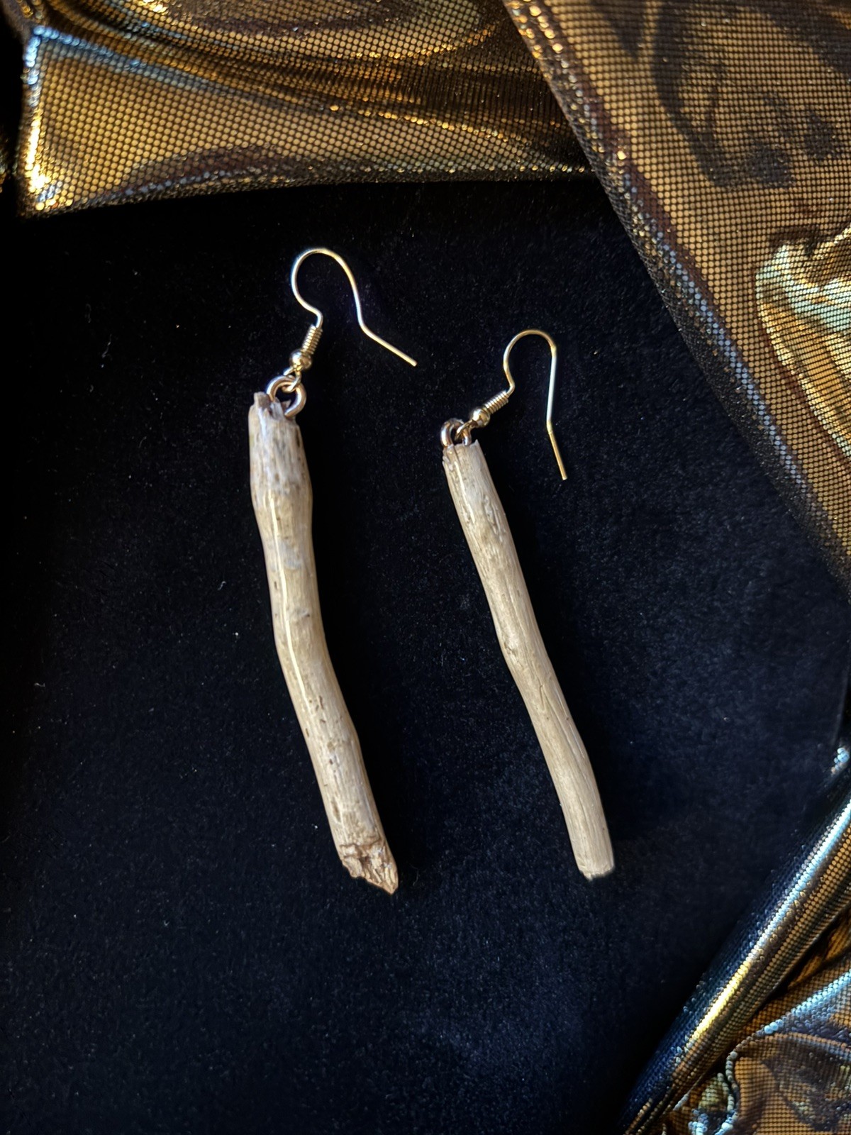 One of a kind jewelry made from real pieces of wood coated in resin