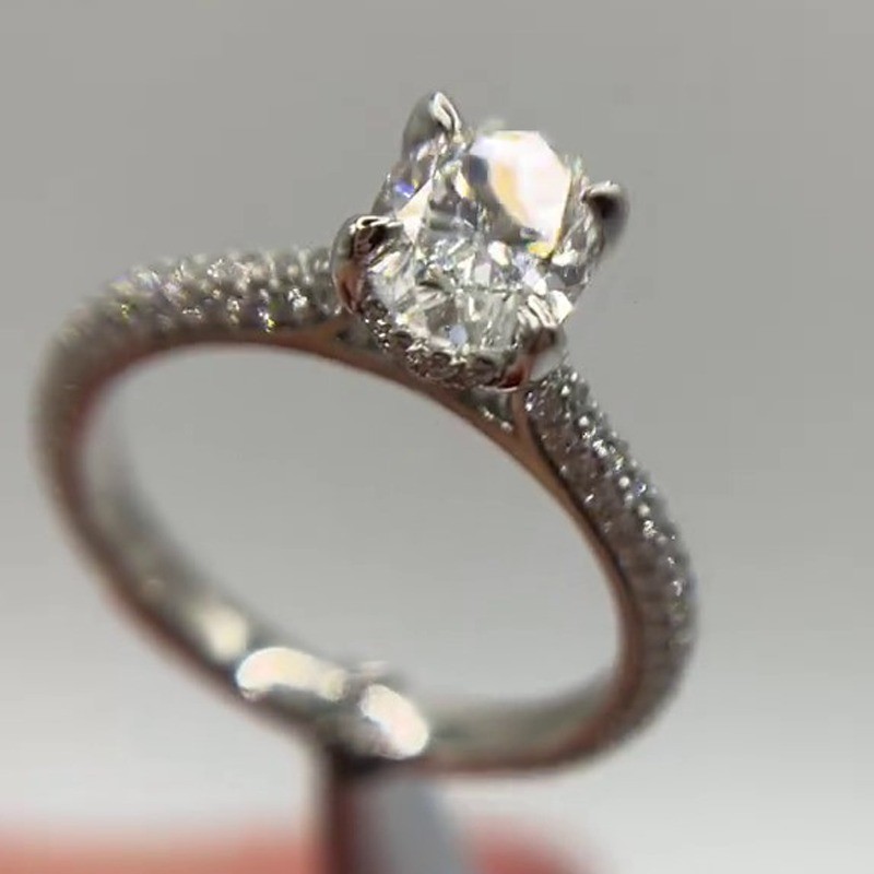1.45TCW Oval Cut Moissanite Hidden Halo Engagement Ring 14K White Gold Plated