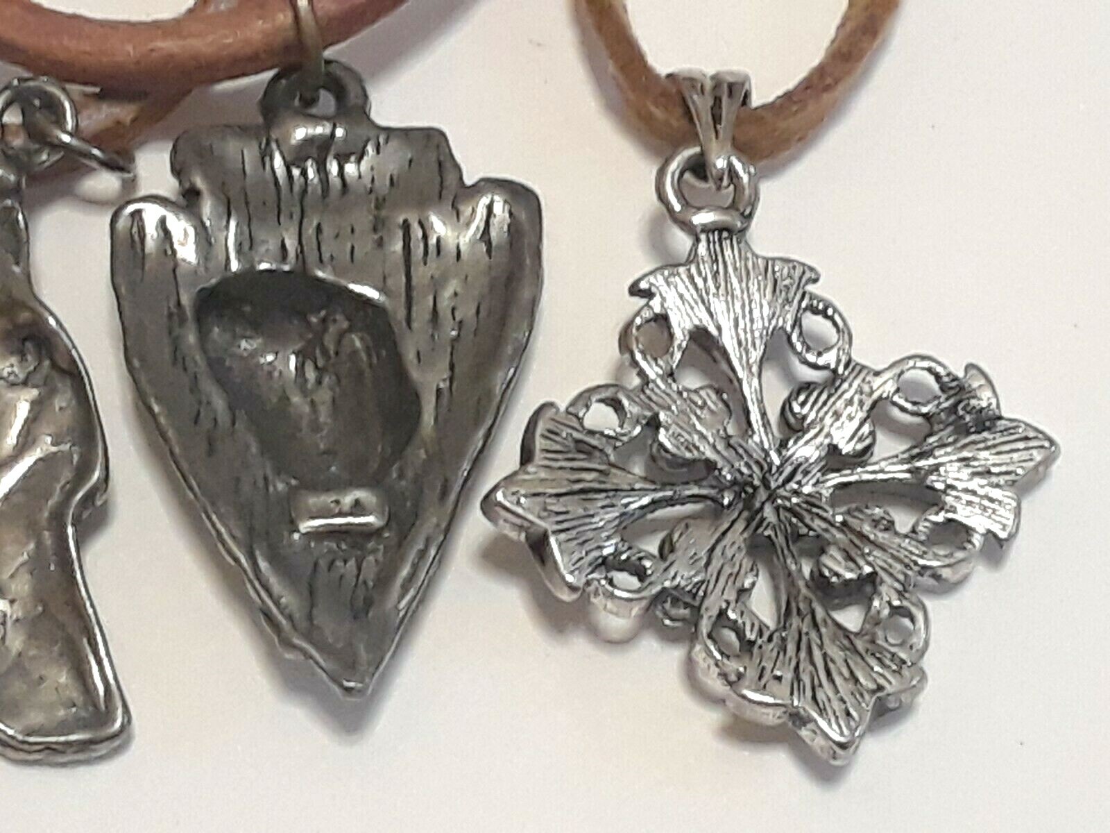 Animal shape pendants silver tone on leather rope chains 18″ long. 5 necklaces