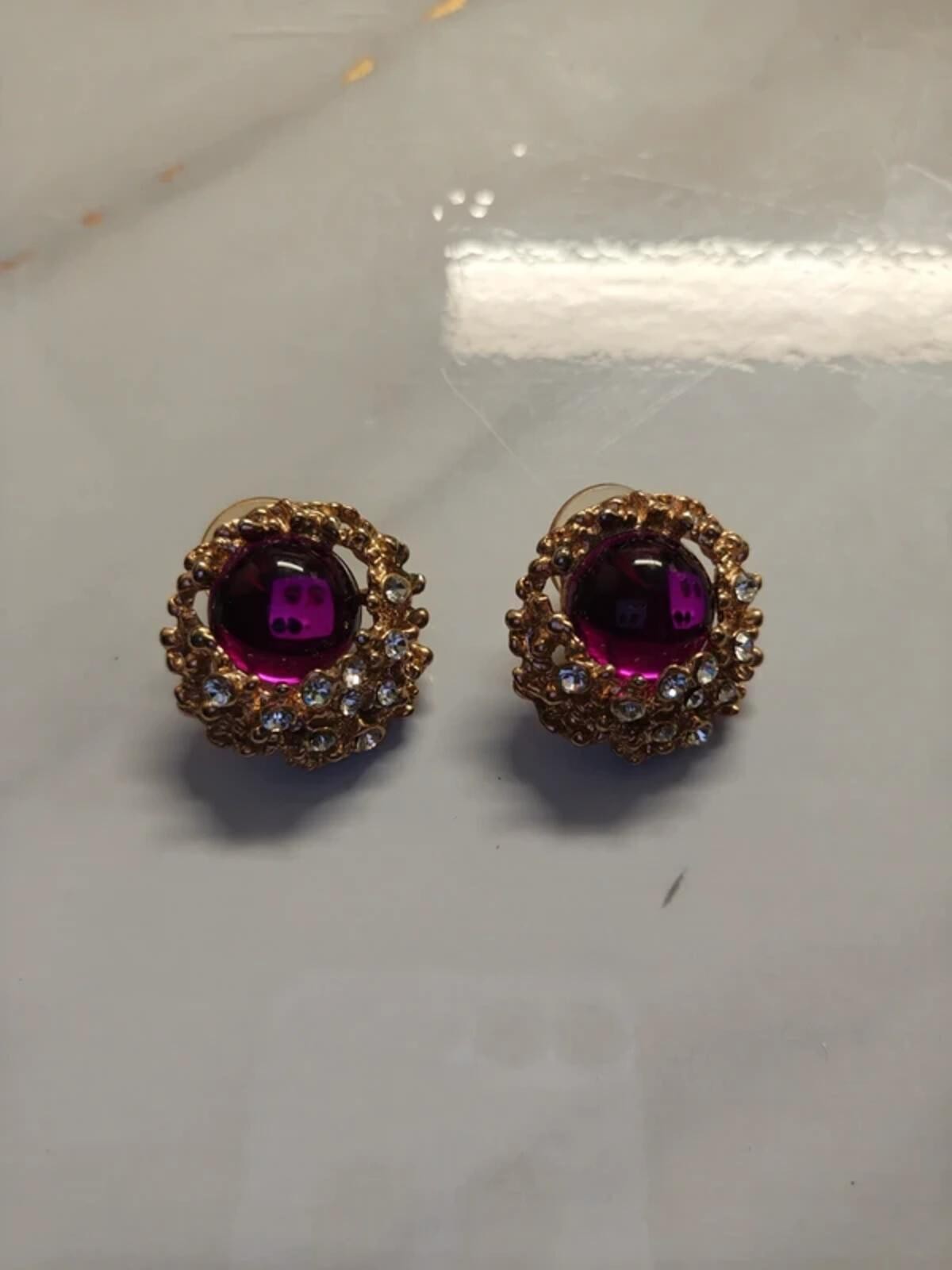 Faux Amethyst gold tone pierce earring