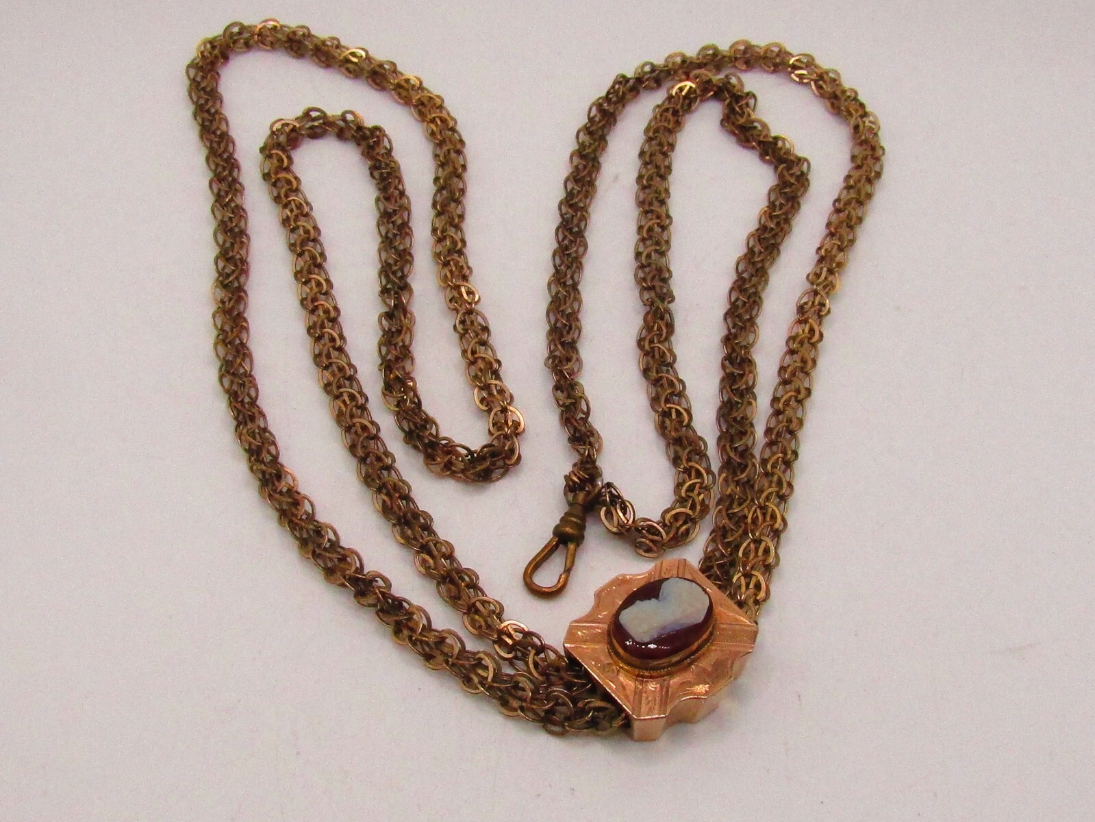 ANTIQUE VICTORIAN LADIES WATCH CHAIN WITH 1OK GOLD CAMEO SLIDE & G.F. CHAIN*