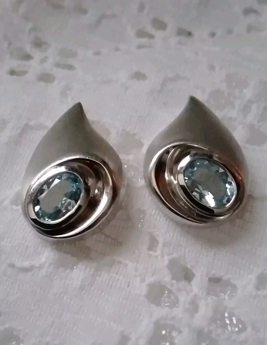Unique Shape Blue Topaz Post Earrings Set In Satin Finish 925 Sterling Silver