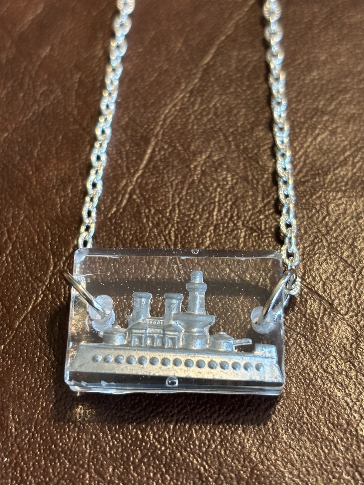 Vintage, Metal Ship Game Piece, Suspended in Resin, on a Silver Plated Chain.WOW