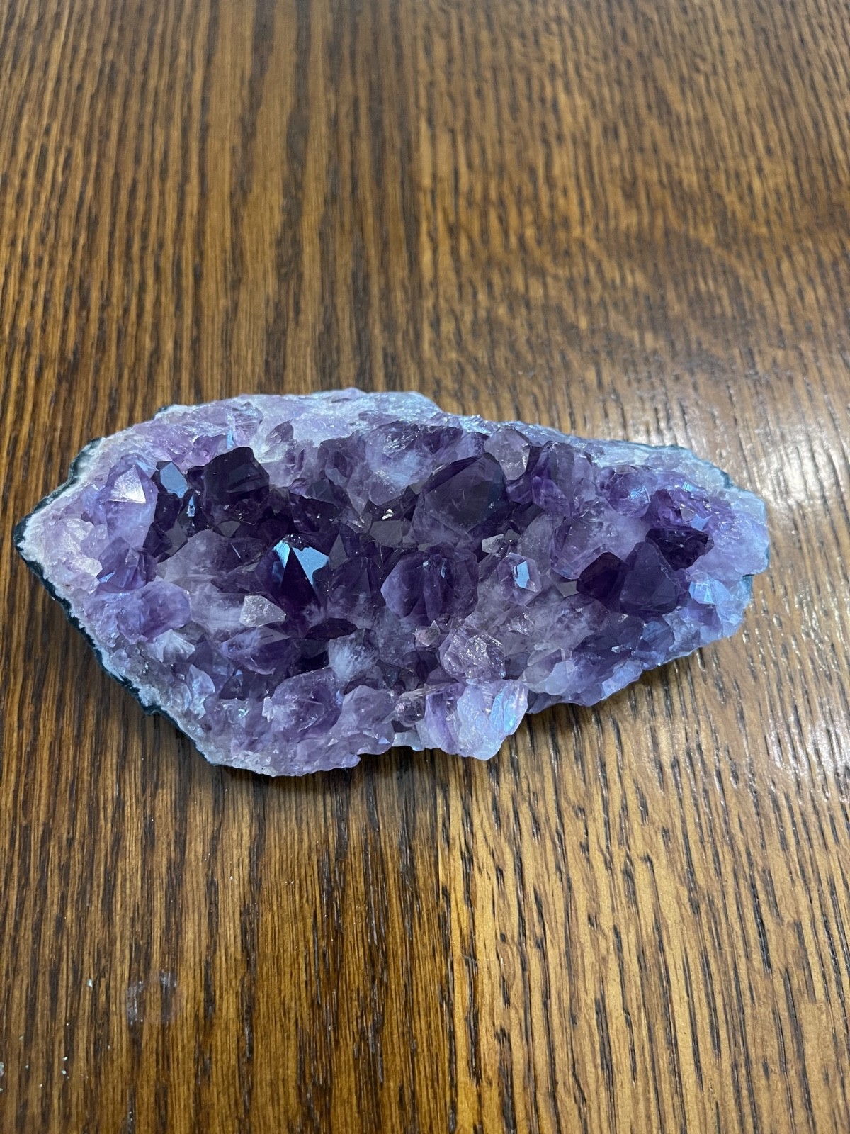 Amethyst crystal 13 inches long, that is natural and weighs 1.3 pounds.