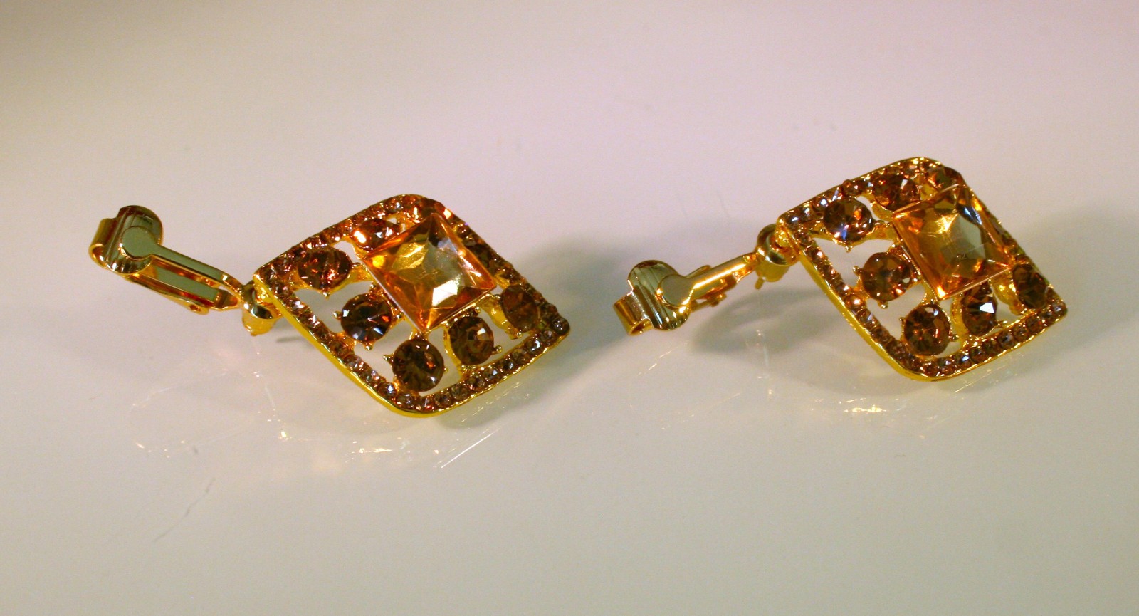 Gold plated topaz rhinestone vintage style clip on dangle earrings 1 3/4″
