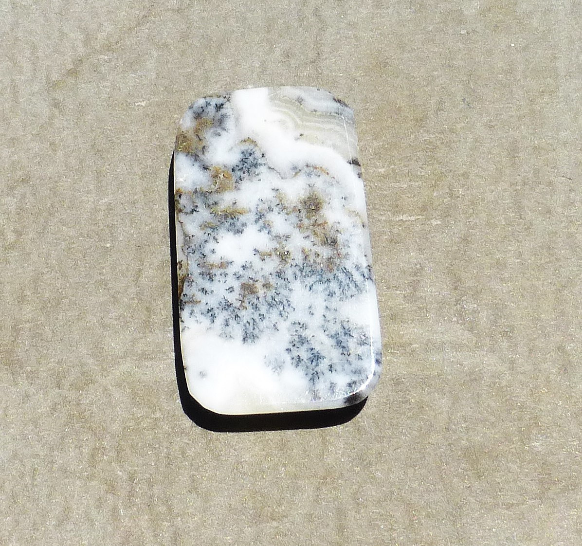 NATURAL manganese dendrites in calcite cabochon from California (36.40 cts.)