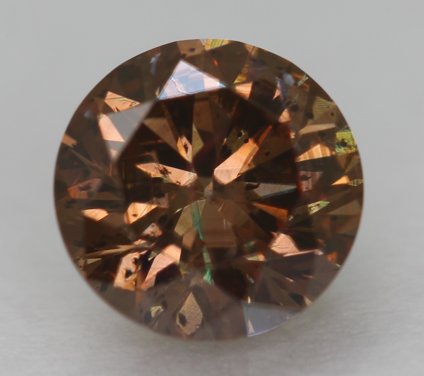 0.64 Carat Yellow Brown VS2 Round Brilliant Natural Enhanced Diamond 5.49m VIDEO