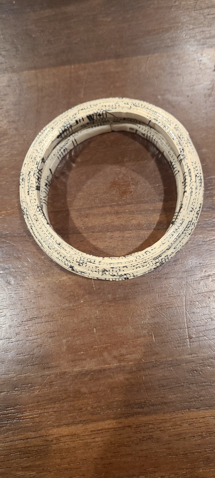 Women’s Bracelet Lightweight Cream Color with Musical Notes 2 3/4″ Opening