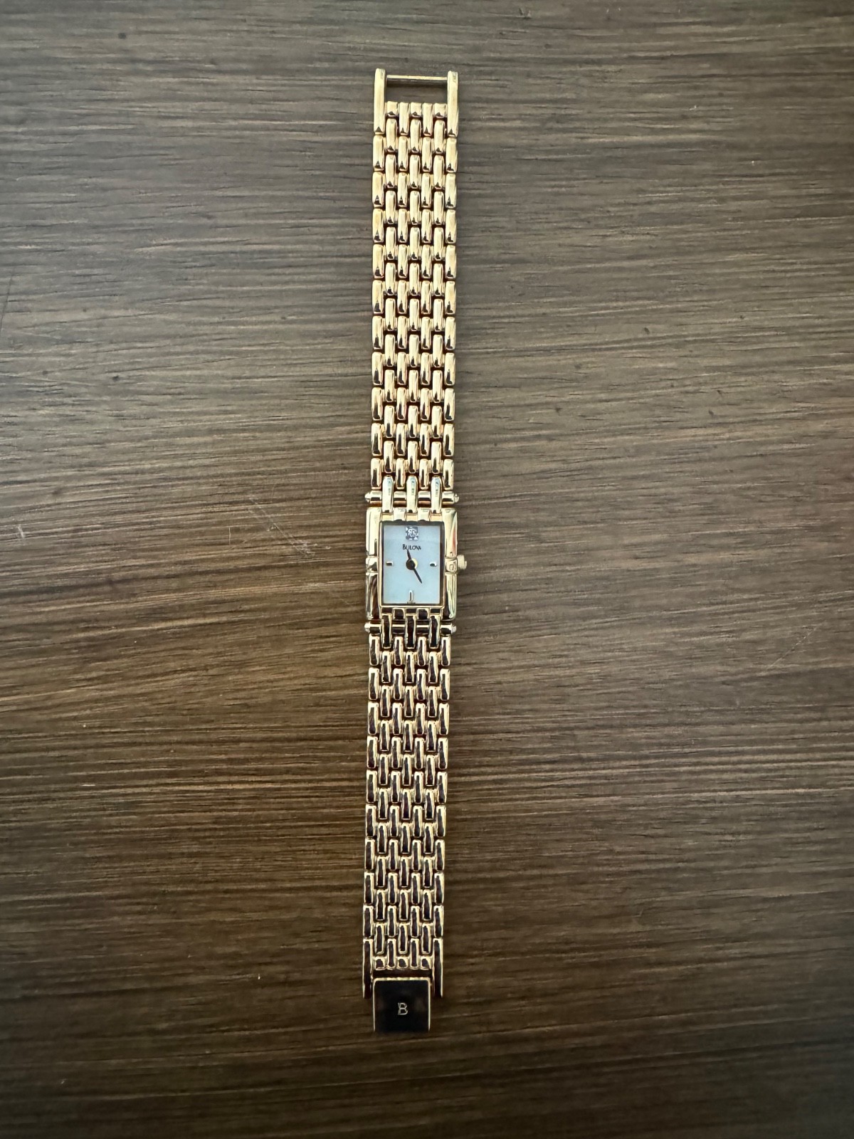 Ladies small Bulova Diamond Accent Quartz 97S49 gold tone watch, works very well