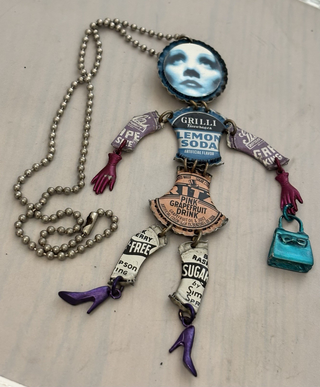 JANET COOPER VINTAGE BOTTLE CAP MARLENE DIETRICH DOLL PIN/PENDENT NECKLACE