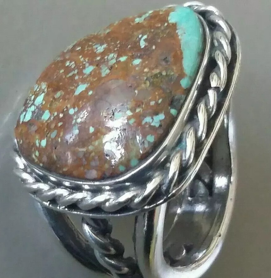 PREOWNED PERFECT 95% COND. ROGER SKEET JR. NAVAJO TURQUOISE/MATRIX RING SZ. 6.75
