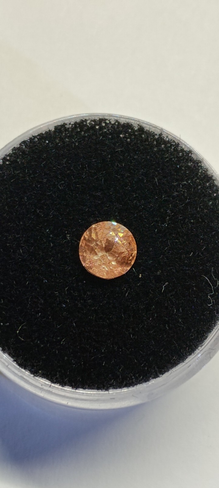 peach schiller faceted Oregon Sunstone 0.80 carat 5.4mm round found & cut in USA