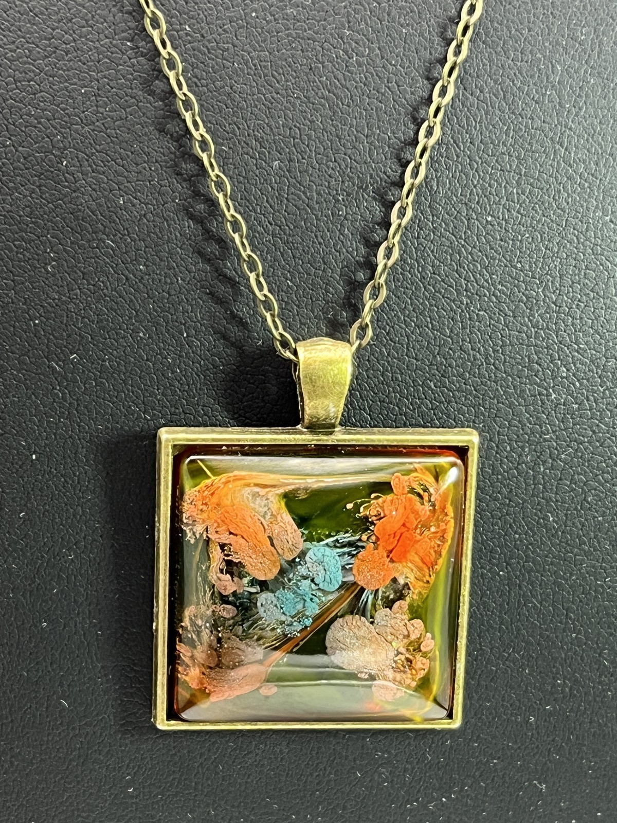 Custom rectangle jewel pendant in bronze, orange, blue & brown on bronze chain