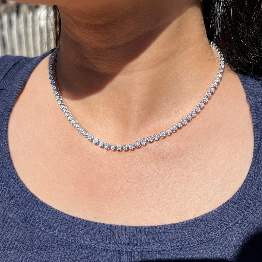 25 TCW Round Cut Moissanite Iced Bezel Tennis Necklace in 14K White Gold Plated