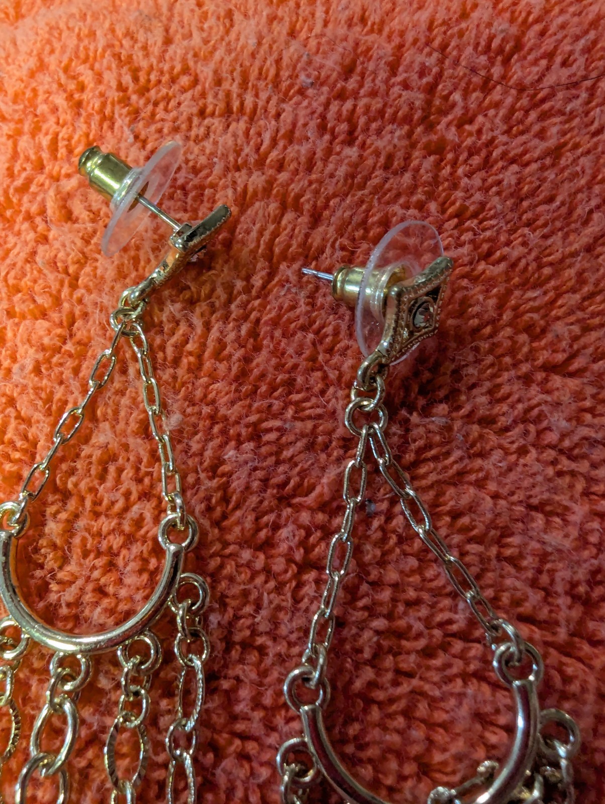 Earrings With Dangling Chains And Various Pendants