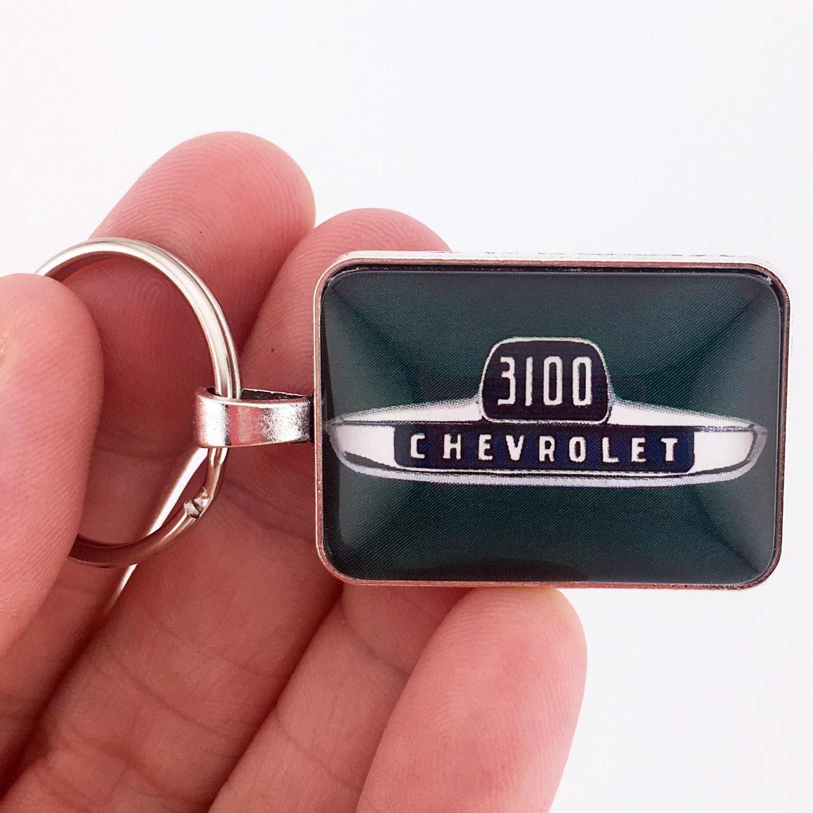 Vintage Chevrolet 3100 Chrome Fender Emblem Dark Green 1″ xz 1.25″ Keychain