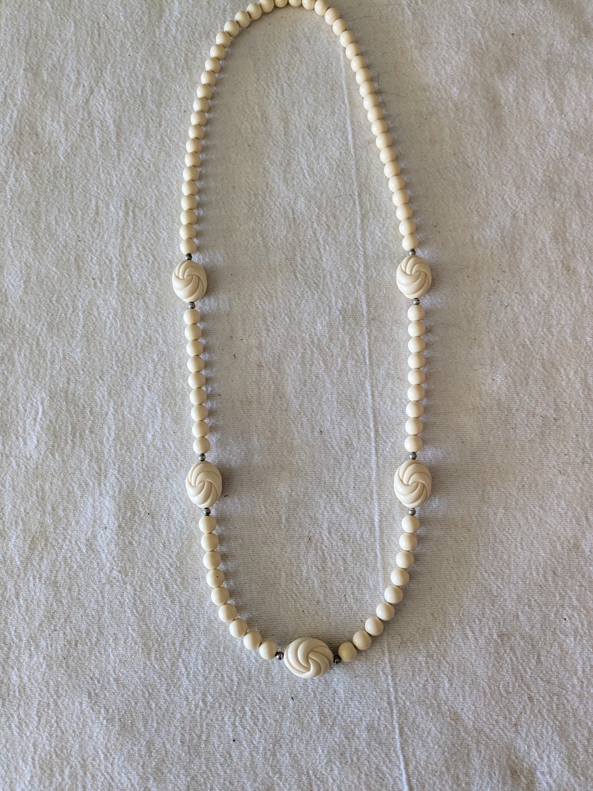 34″ Cream Acrylic Bead Necklace With 3 Lover’s Knot Stations