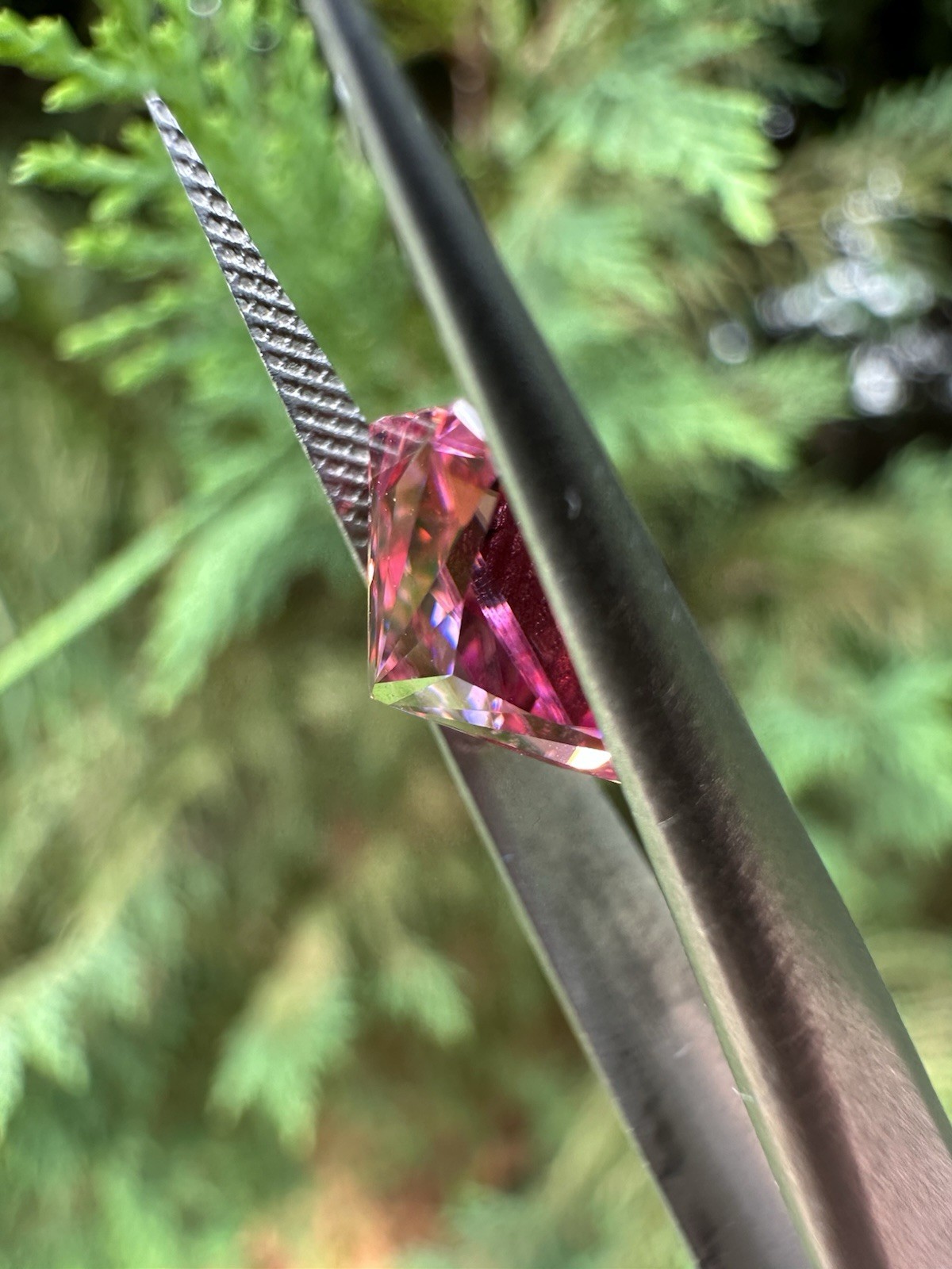 3 carat 5 x 7 mm pink emerald cut moissanite (passes diamond test)