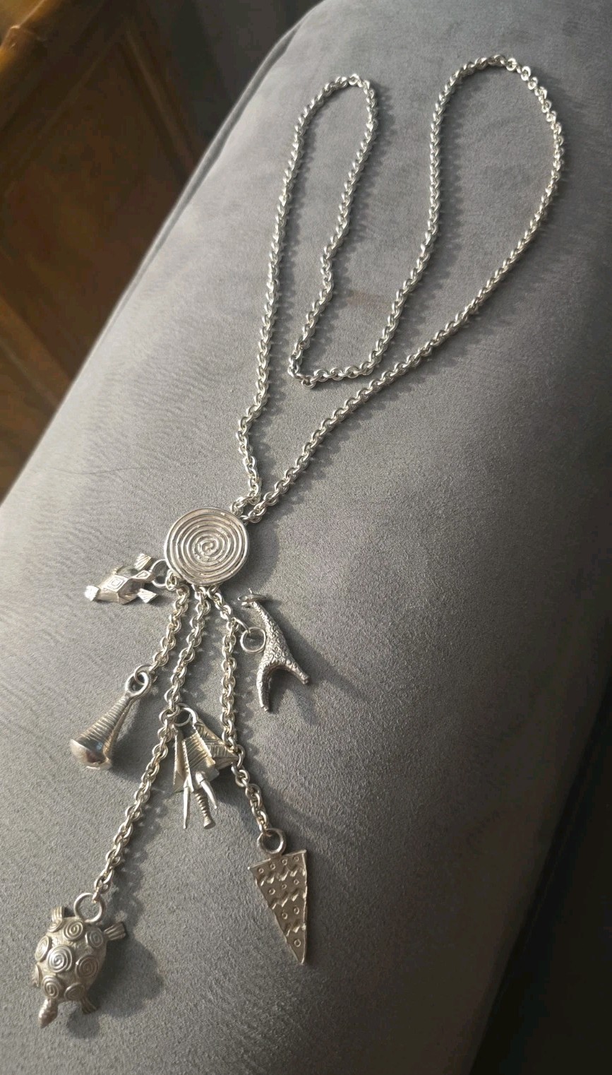 Susan Cummings sterling silver charm necklace African animals abstract tribal