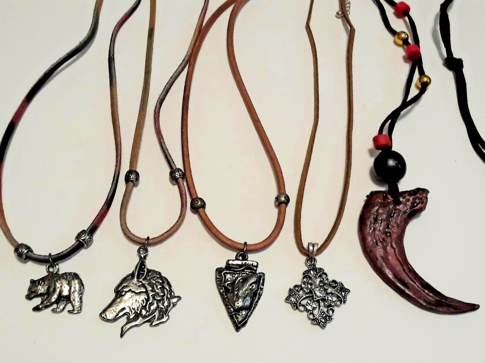 Animal shape pendants silver tone on leather rope chains 18″ long. 5 necklaces