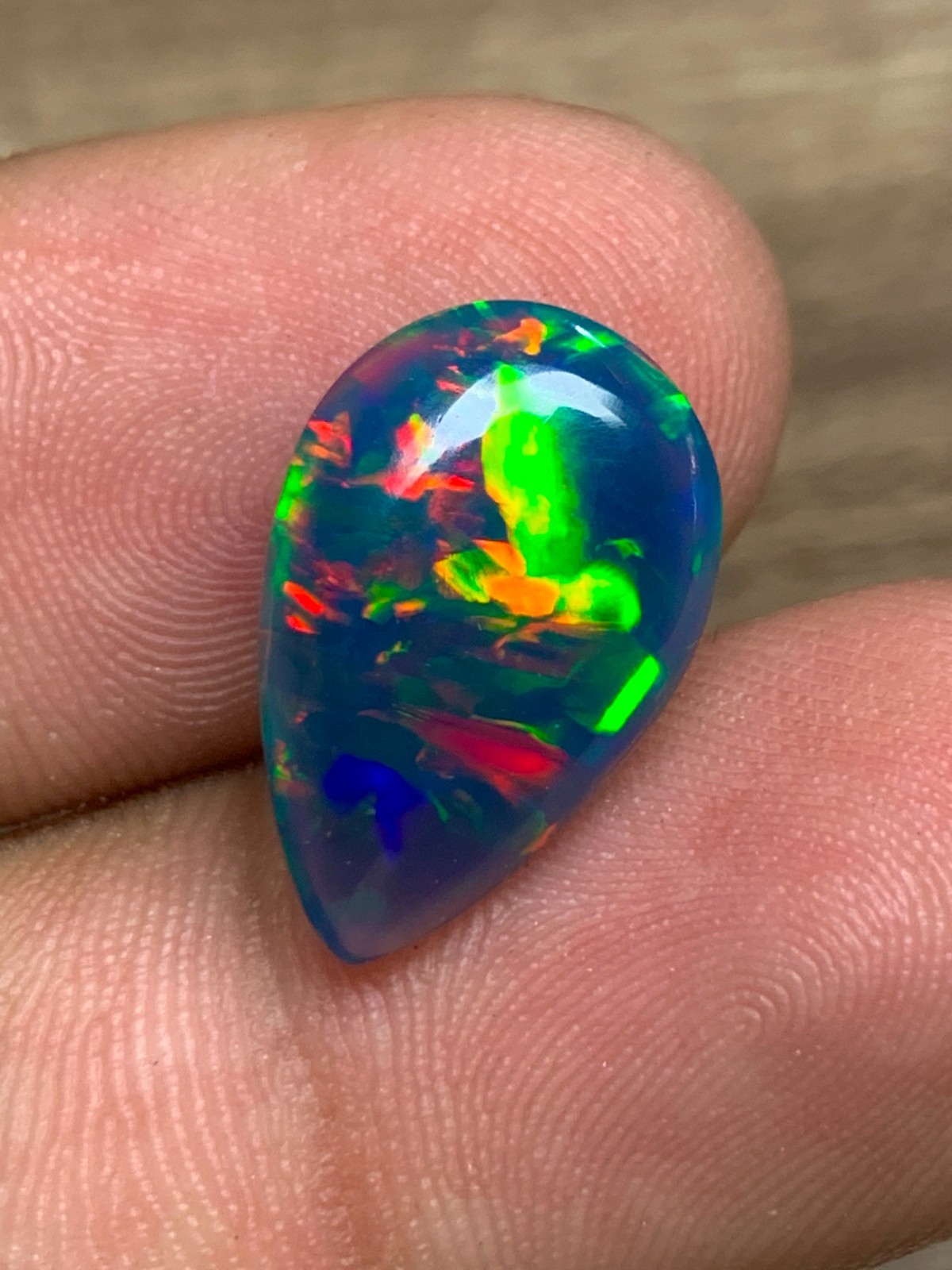 Ethiopian Opal Gemstone 4.65crt Pear Cabochon Black Welo Rainbow Flash Gemstone