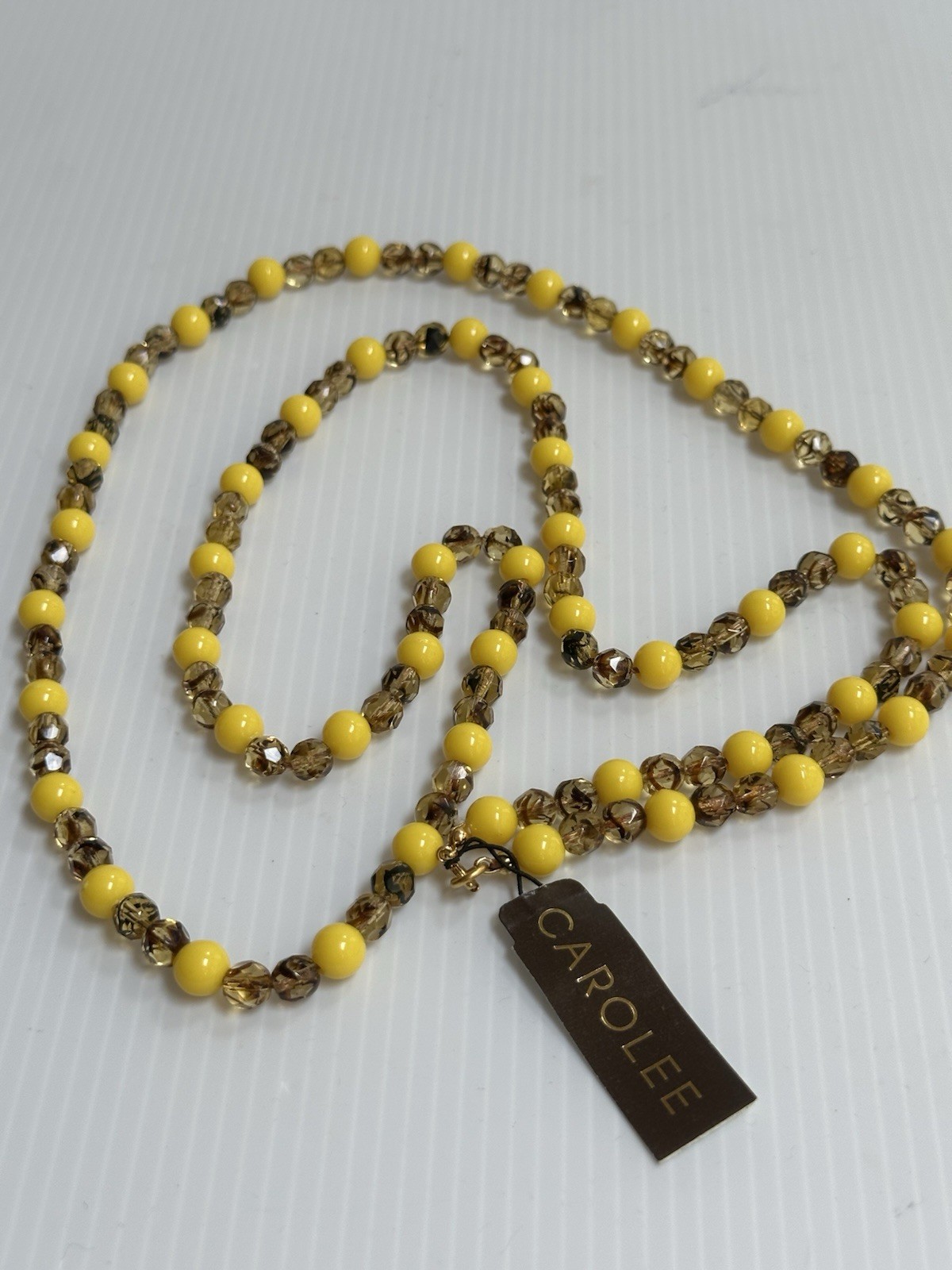 VINTAGE 1970s CAROLEE YELLOW BROWN ACRYLIC FACETED GLASS BEADS 40”LONG NECKLACE