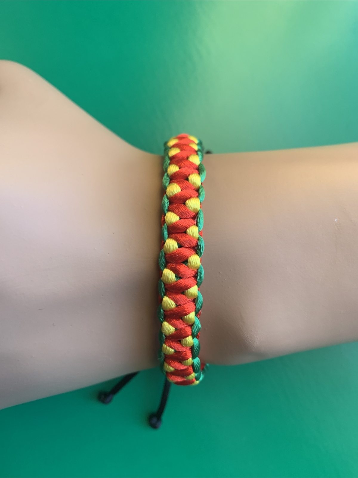 GUYANA Bracelet RED BLACK YELLOW GREEN Satin Rattail Cord Shamballa Nylon