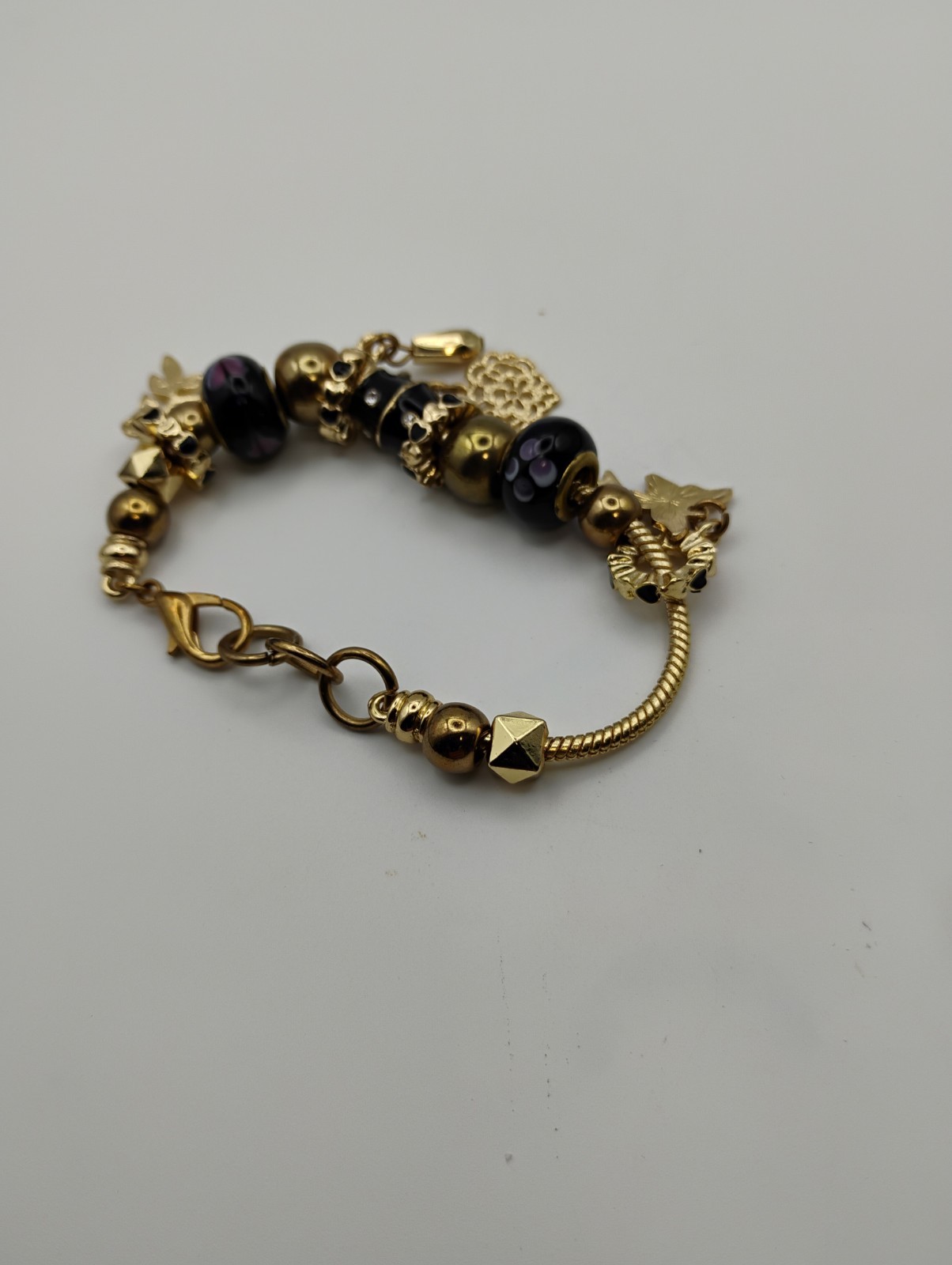 Landau Infinity Charm Bracelet Gold Tone Black Glass Beads Butterfly Arrow 7.5