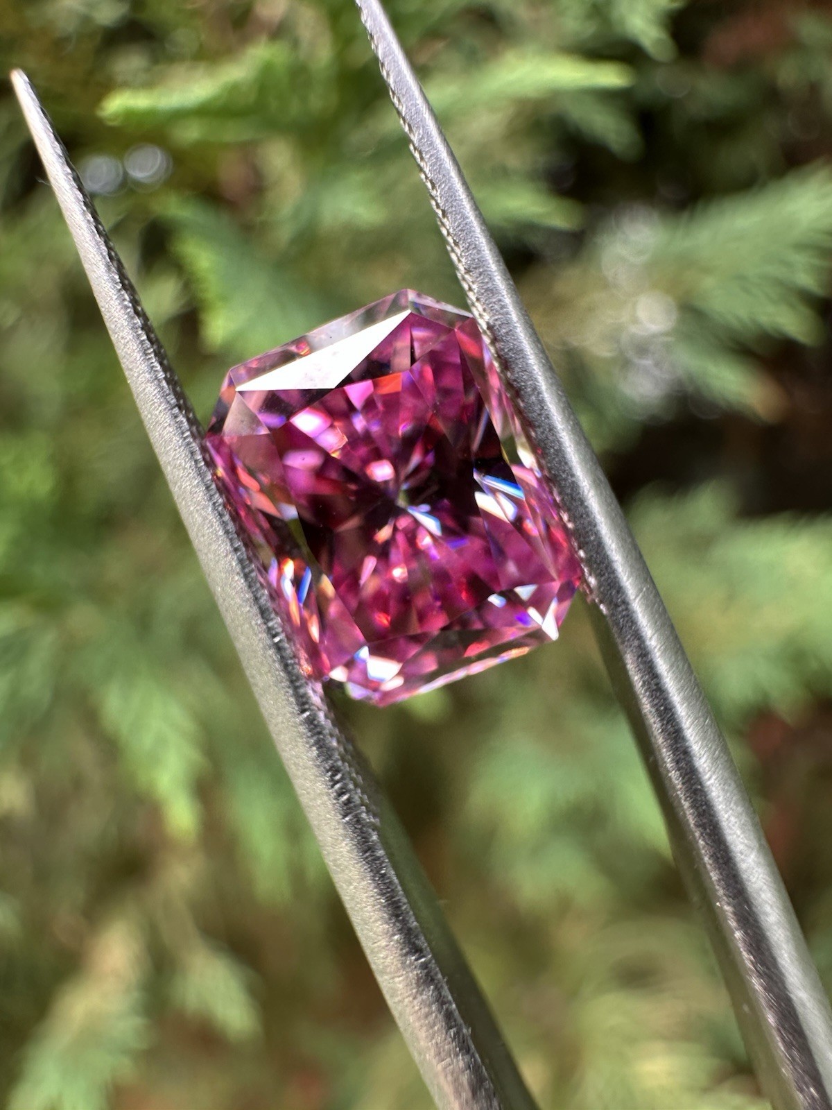 3 carat 5 x 7 mm pink emerald cut moissanite (passes diamond test)