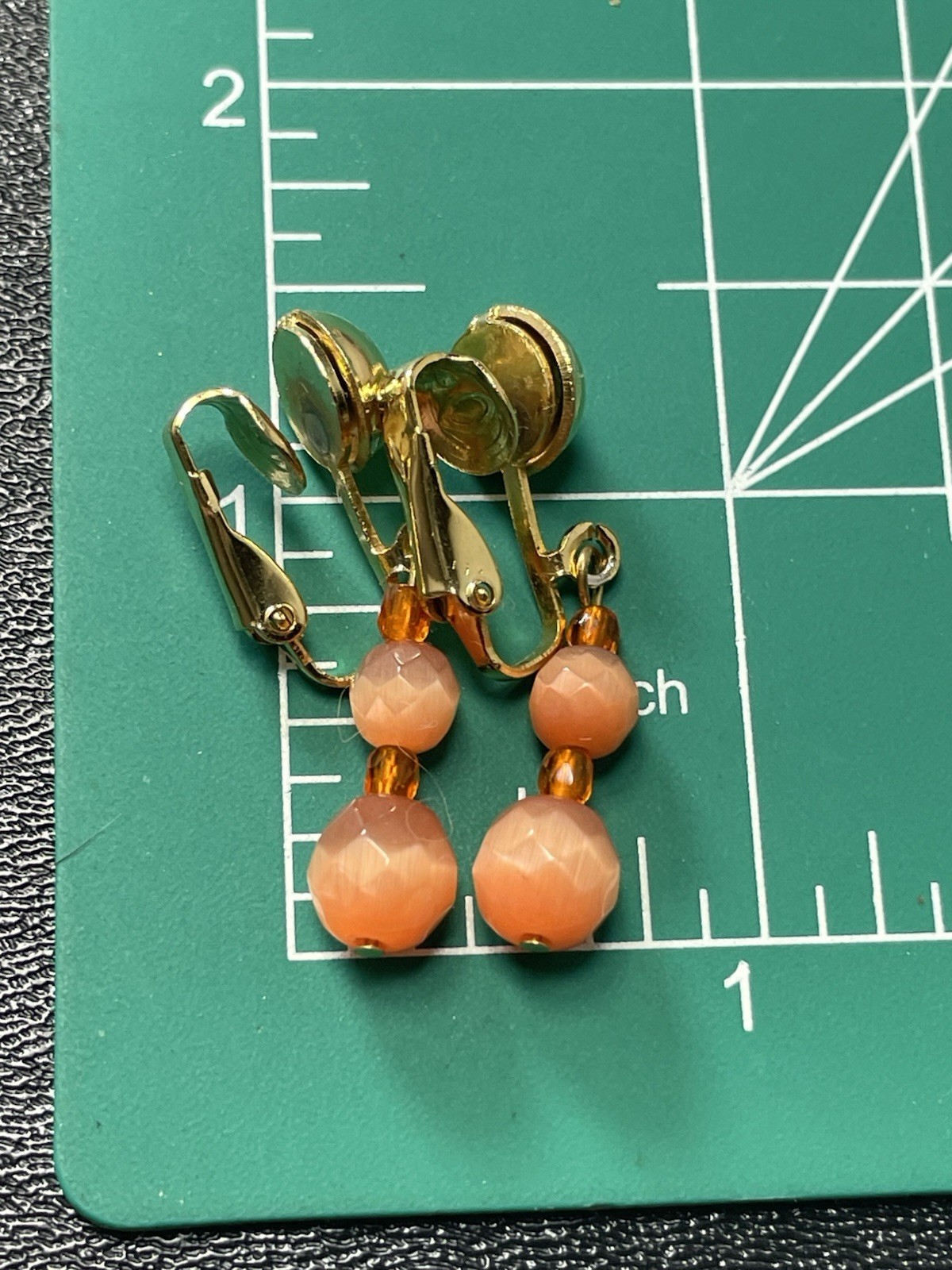 Vintage 1.4” Orange Faceted Art Glass Gold Tone Dangle Clip Earrings