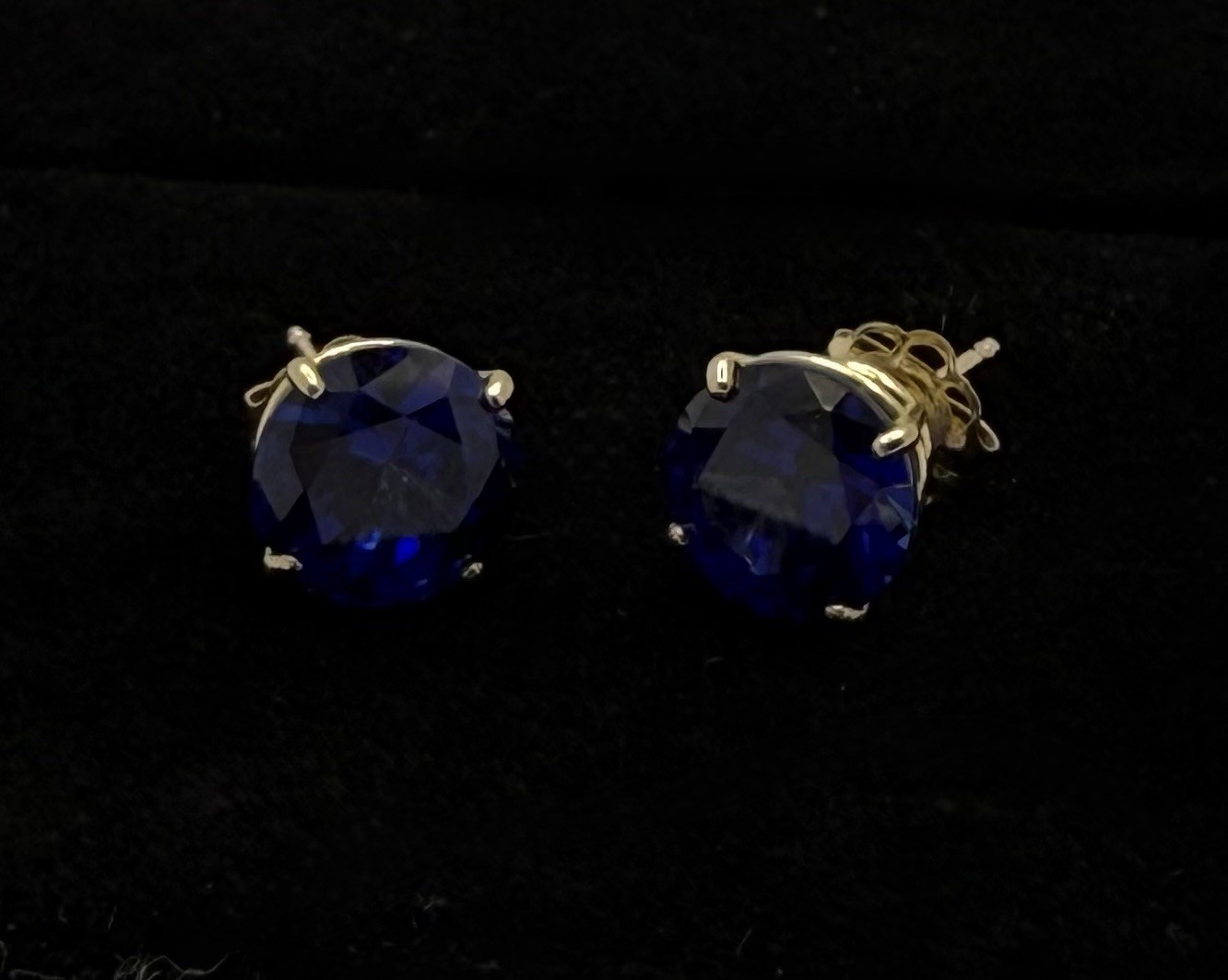 14 K Gold Blue Stud Earrings. 6mm. Stamped JCM.