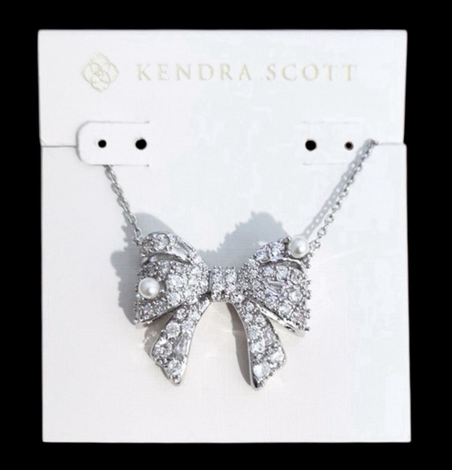 New Krista Silver Bow Short Pendant Necklace in White Mix on Kendra Scott Card