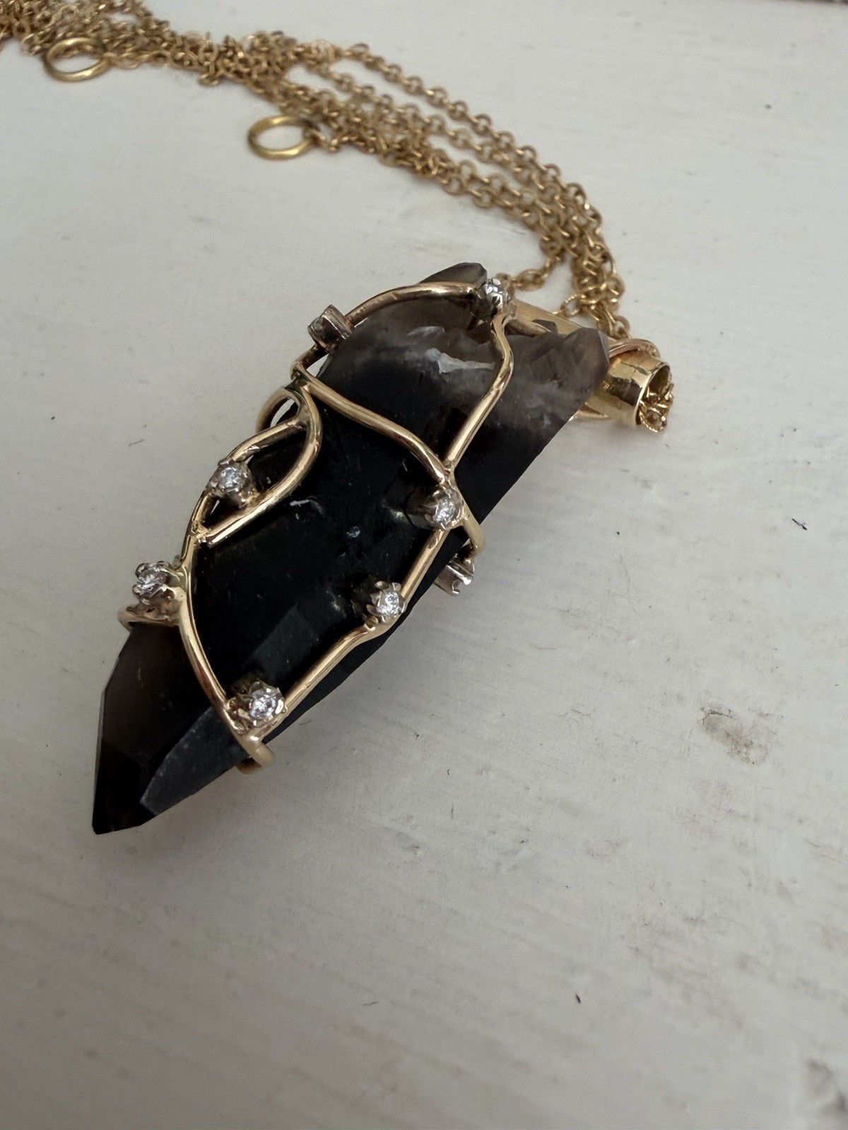 Terminated smoky quartz,wire wrapped in gold with diamond accents, pendant only