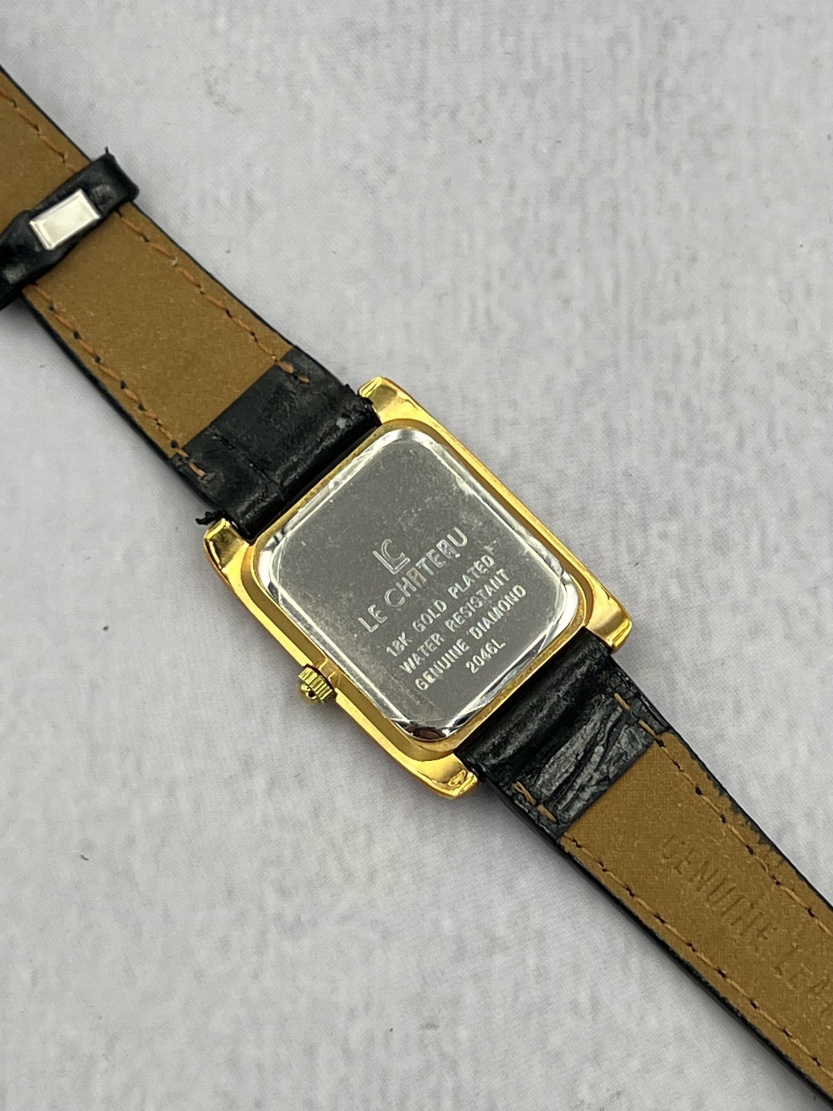 Le Chateau Women’s Black Leather Band Black Dial Genuine Diamond Dress Watch