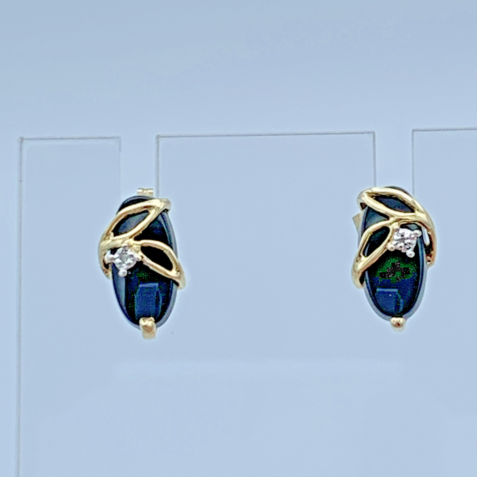 14k Yellow Gold Black Onyx Stud Earrings With A Diamond Chip Accent